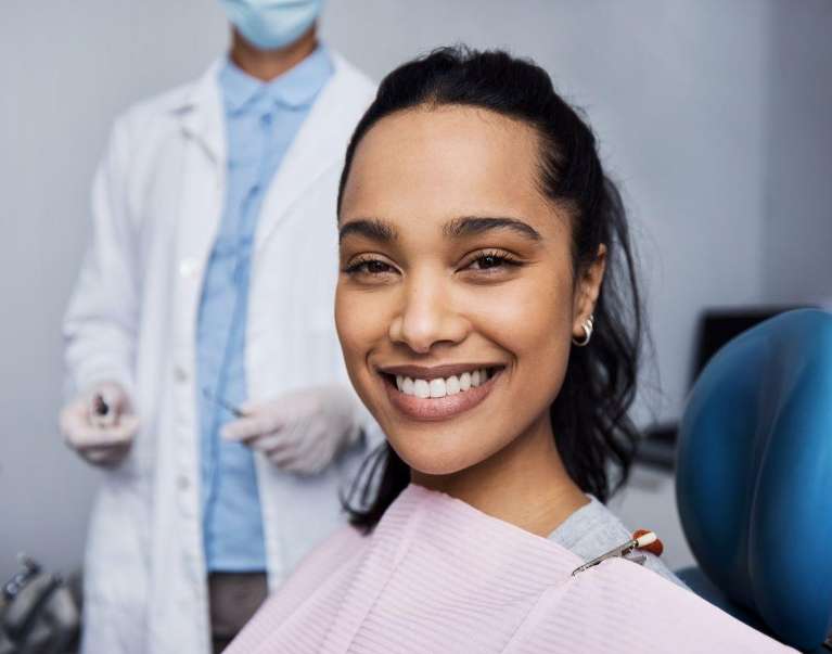 Raleigh woman smiling in dental chair