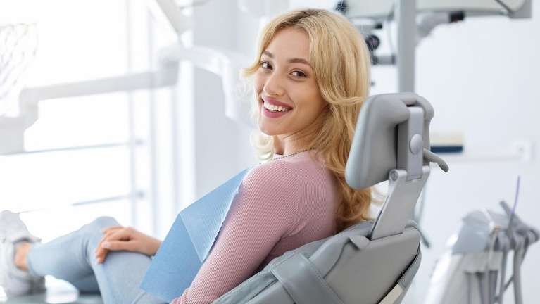 woman at her raleigh nc dentist