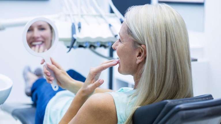 women at the dentist in raleigh nc